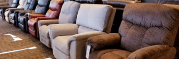 Luxurious leather reclining sofa at The Furniture Mall, perfect for ultimate relaxation and style.