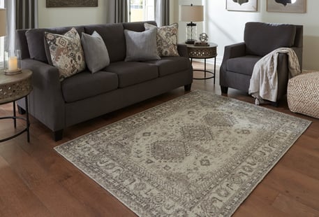 Wool area rug by Ashley