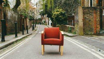 Single modern chair with sleek design and comfortable cushioning.